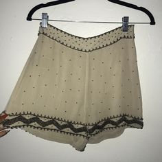 Off White Color With Beads Decorated All Around The Shorts. Fits A Size 2. Loose Fit Mid Waist. See Thru Shorts. Perfect Condition/ Never Worn. Delicate Material. Beige Party Bottoms Short Length, Chic Embellished Shorts, Embellished Short Bottoms For Summer, Casual Embellished Summer Shorts, Casual Embellished Bottoms For Summer, Casual Embellished Summer Bottoms, Beige Bottoms For Summer Party, Beige Summer Party Shorts, Beige Shorts For Night Out