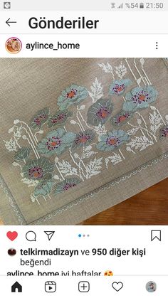 the screen shot shows an embroidered cloth with flowers and leaves on it, as well as text that reads gonderlierr