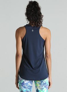 22.5" tank length Scalloped edge in back the covers backside Made with LINK® 4-way stretch material Lightweight, breathable and loose fitting UVB protection 50+ Length by size: SIZE 1: 22.5" front length and 26.5" back length SIZE 1.5: 22.5" front length and 26.5" back length SIZE 2: 23.5" front length and 27.5" back length SIZE 3: 24.5" front length and 28.5" back length Sleeveless Go-dry Elastane Activewear, Athleisure Activewear For Workout With Solid Back, Sporty Activewear For Workout With Solid Back, Sporty Activewear With Solid Back For Workout, Sporty Stretch Activewear, Casual Sleeveless Elastane Activewear, Solid Back Stretch Activewear, Athleisure Activewear With Solid Back And Stretch, Athleisure Activewear With Stretch And Solid Back