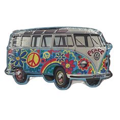 a vw bus decorated with flowers and peace signs