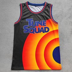 a basketball jersey with the words tune squad on it and an orange, blue, and yellow design