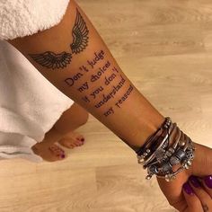 a woman's arm with a tattoo saying don't judge my story if you didn't understand it