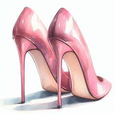 a pair of pink high heeled shoes sitting next to each other