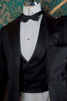 "The pricing on this listing is for a 3pc Handsewn Tux with the muslin fitting. We can make a similar tux in our Decadence '89 style with less handwork for a lower price. 1909 BESPOKE: These are our completely custom handmade suits. Each suit is crafted for an individual customer based on his tastes and lifestyle, and the price of the suit includes us spending 4 hours on designing your suit alone and sketching ideas. These suits are completely patterned, cut, and sewn here in our studio in Denve Classic Three-piece Suit With Pressed Crease For Black-tie Events, Classic Fitted Three-piece Suit For Black Tie Event, Fitted Classic Three-piece Suit For Black Tie Event, Classic Fitted Suit And Tie Accessories For Semi-formal Occasions, Timeless Notch Lapel Three-piece Wedding Suit, Formal Fitted Three-piece Suit, Tailored Timeless Three-piece Wedding Suit, Classic Black Tie Three-piece Suit, Classic Tuxedo With Notch Lapel