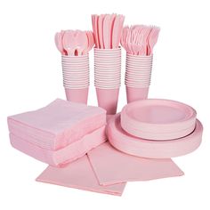 pink party supplies including plates, cups and napkins