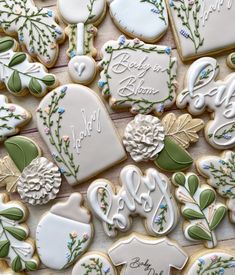 some decorated cookies are laying on a table