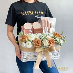 a woman holding a basket filled with flowers and personal care items for her daughter's birthday