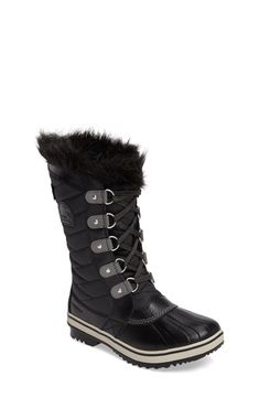 A diamond-quilted shaft and smooth trim add textural interest to a waterproof boot topped with a fluffy cuff. Cozy faux-fur lining with 100 grams of fixed insulation provides a soft, warm barrier between little feet and cold winter winds. 1 1/2" heel 9" shaft Lace-up style Removable molded EVA insole 100g insulation Leather or leather and textile upper/textile faux-fur lining/rubber sole Imported Kids' Shoes Big Kid, Waterproof Boots, Winter Boot, Girls Shoes, Black Boots, Kids Shoes, Insulation, Faux Fur, Shoe Boots