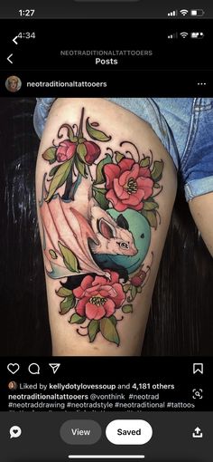 a woman's thigh with flowers on it and an image of a bird in the middle