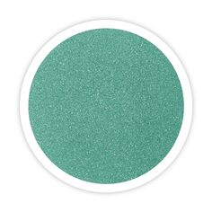 a green glitter disc on a white background