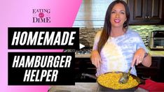 a woman standing in front of a frying pan filled with food and text reading homemade hamburger helper