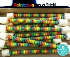 rainbow marshmallows on a stick in a box with the text overlay