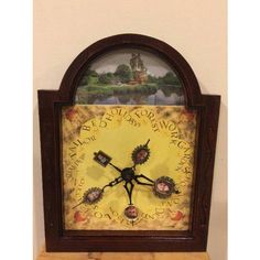 an old clock with pictures on the face