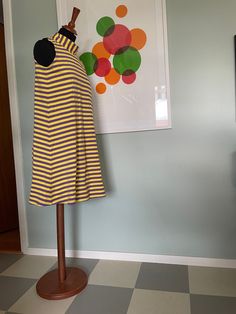 This is a fun and cozy Sleeveless Dress from Finnish company Marimekko. 1990s original style. Classic stripes. Yellow & Purple, bright colors.  (I have the same one in Black & White Stripes as well) Nice soft cotton cloth.  100% cotton. Marked as Small. could also fit a smaller medium.  very Good condition.  Don't hesitate to ask for measurements. Made in Suomi Finland. ♪♫♬ Retro Stretch Sleeveless Mini Dress, Retro Fitted Sleeveless Cotton Dress, Retro Fitted Sleeveless Sundress, Vintage Striped Sleeveless Dress, Yellow Fitted Sleeveless Cotton Dress, Fitted Sleeveless Yellow Cotton Dress, 60s Mod, Yellow Purple, Style Classic