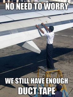 a man standing on top of an airplane next to another person holding onto the wing