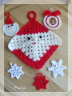 a crocheted christmas ornament and other decorations