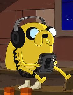 a cartoon character with headphones holding a cell phone