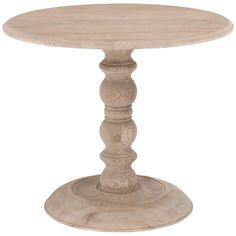 a wooden table with an intricate design on it's base and round pedestals