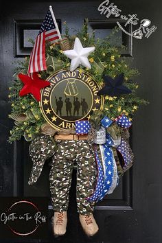 the wreath is decorated with american flags and other decorations