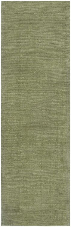 an area rug with green colors