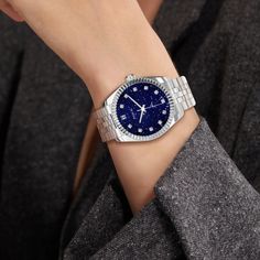 The classic and elegant Timeless Classic watch, the dial is made of deep blue and unique shining luster of blue sandstone, creating a mysterious and romantic starry sky on the wrist; the stainless steel case is paired with charming diamonds, echoing the starry dial, showing a unique fashion taste. Case: 31mm and 36mm steel case with polished and satin finish Waterproofness: 10ATM Swimming is allowed, but only for shallow swimming (Do not operate the watch handle head in water or when the watch i Elegant Blue Watches For Gifts, Timeless Blue Diamond Watch With Subdials, Timeless Blue Watch Accessories With Skeleton Dial, Elegant Blue Diamond Watch With Round Dial, Blue Timeless Watch With Skeleton Dial, Timeless Blue Diamond Watch, Blue Timeless Diamond Watch, Head In Water, Elegant Blue Watch With Metal Dial