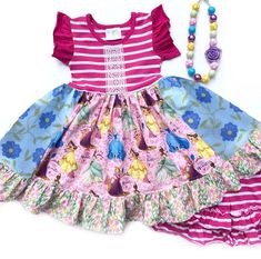 Our Listen to your heart Princess dress is fashioned in our knit purple stripe bodice & a cotton full ruffle skirting, perfect for wowing the crowd! Custom designed from a delightful mix of prints that please & colors that pop. Great for theme parties, movie outings, magical vacations, birthday parties, portraits, & everyday wear!All designs are tagged in the even size. Size/length: 12mo/18mo: 17" 2/3: 21" 4/5: 24" 6/7: 26" 8" 28"Chest width unstretched: sz 12mo/18mo: 20" 2/3: 20" 4/5: 22.5" 6/7 Fitted Purple Dress With Ruffled Skirt, Playful Fitted Twirl Dress With Ruffles, Fitted Twirl Dress For Spring Dress-up, Fitted Pink Twirl Dress For Dress-up, Pink Fitted Twirl Dress For Dress-up, Fitted Whimsical Twirl Dress For Summer, Whimsical Fitted Twirl Dress For Spring, Whimsical Fitted Twirl Dress For Summer, Spring Princess Dress With Ruffled Skirt