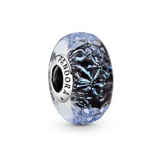 From Pandora, get lost in the intricate patterns that are hidden inside the Wavy Dark Blue Murano Glass Ocean Charm. The ocean-inspired charm is hand-finished with iridescent and dark blue Murano glass infused with a sprinkling of glitter, wrapped around a sterling silver core. The blue charm finished with a wavy surface inspired by the waves of the ocean. Wear the wave charm to stay connected to the power of the ocean, no matter where in the world you are. Bracelet is not included with purchase