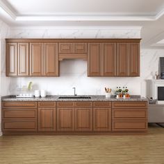 a large kitchen with wooden cabinets and marble counter tops, along with hardwood flooring