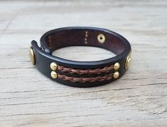 Horse Hair Leather Bracelet with Solid Brass Name Plate & Antique Brass Snap - 5/8" Horsehair Cuff Classic Adjustable Double Band Bracelets, Classic Adjustable Double Band Bracelet, Handmade Classic Braided Bracelets, Classic Handmade Adjustable Braided Bracelets, Classic Adjustable Handmade Braided Bracelets, Classic Handmade Adjustable Leather Bracelet, Hand Tooled Adjustable Jewelry For Everyday, Classic Handmade Adjustable Cuff Bracelet, Classic Adjustable Braided Bangle Bracelet