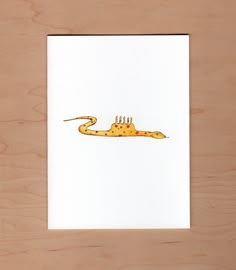 a piece of paper with a drawing of a giraffe on it