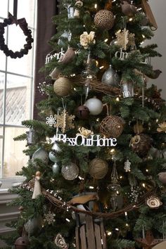 a christmas tree decorated with ornaments and lights