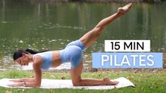 a woman doing yoga on a towel in front of a body of water with the words 15 min pilates