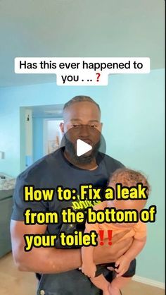 a man holding a baby in his arms with the caption how to fix a leak from the bottom of your toilet?