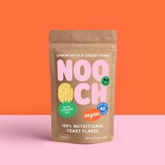 a bag of nooch cereal on an orange and pink background