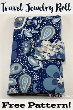 a blue and white flowered fabric with the words travel on it, in front of an