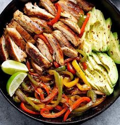 chicken fajita skillet with peppers, cucumbers and avocado