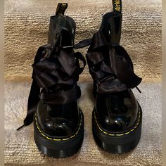 Elevate Your Footwear Collection With These Stunning Retro Dr. Martens Boots. These Unique Boots Feature An Eye-Catching Platform Silhouette, Accentuated With Patent Leather And Ribbon Laces That Adds A Touch Of Edgy Sophistication. Key Features: - Size:Us 6 - Design:Patent Leather Platform Boots - Details: Ribbon Laces For A Fashionable Look. - Condition: Like New, Only Worn Once Perfect For Fashion-Forward Individuals Who Appreciate Exclusive, High-Quality Footwear. Don't Miss The Chance To Ow Ribbon Shoe Laces Dr Martens, Alternative Style Leather Lace-up Boots With Platform, Ribbon Doc Martens, Ribbon Lace Doc Martens, Patent Leather Platform Boots, Boots With Ribbon, Alternative Lace-up Platform Boots With Metal Feet, Ribbon Shoe Laces, Leather Platform Boots