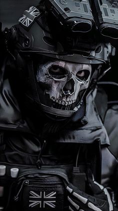 a man wearing a motorcycle helmet with skull decorations on it's face and chest