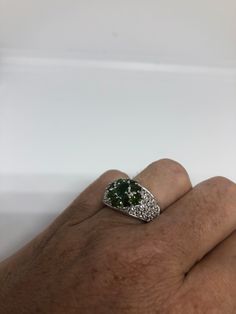 Rich and very bright green chrome diopside ring Sterling silver with rhodium finish Size 6 can be sized by my jeweler. His service charge is $10-$20 All rings are shipped in a nice gift box. Check out our over a THOUSAND great reviews Engraving is $4 per letter and is not always perfect depending on the piece. It can take a few days if the jeweler is busy. This is payable to Paypal Judithsltd@gmail.com Hallmarked Emerald Ring With Diamonds, Green Emerald Ring Stamped 925 For Promise, Anniversary Green Sterling Silver Ring, Green Emerald Ring Hallmarked For Anniversary, Green Hallmarked Emerald Ring For Anniversary, Green Diamond Multi-stone Jewelry, Green Intricate Sterling Silver Jewelry, Silver Tsavorite Ring In Fine Jewelry Style, Green Goth Rings