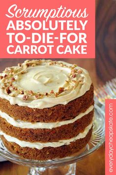 a carrot cake with white frosting and walnut sprinkles is on a glass plate