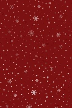 a red background with white snowflakes and dots on the bottom half of it