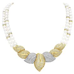 An exciting collar necklace, showcasing intricately designed leaves encrusted with diamonds weighing 14.30 carats total, suspended on two pearl strands. Finely made with 18K yellow and white gold. Perfect for luxurious events. Pearls measure 6.10-6.50 mm in width. Roman Malakov is a custom house, specializing in creating anything you can imagine. If you would like to receive a special quote on a custom piece, please message or call us. Double Strand Pearl Necklace, Dramatic Necklace, Pearl And Diamond Necklace, Double Strand Necklace, Cultured Pearl Necklace, Modern Necklaces, Brown Diamond, Diamond Pendant Necklace, Multi Strand Necklace