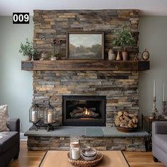 a living room with a fire place in the center and a painting on the wall