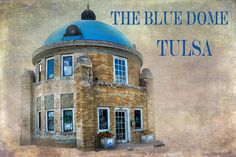 the blue dome tulsa is located in front of an old building with windows