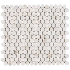 a white tile with circles on it