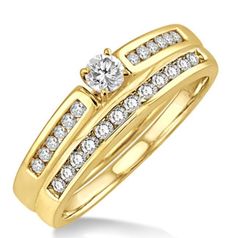 a yellow gold wedding ring set with diamonds