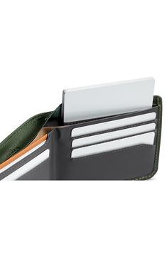 Hidden pockets provide some extra storage room in a super-slim wallet crafted from responsibly sourced, vegetable-tanned leather. Interior currency pouch; slip pockets; five card slots Leather Imported Modern Trifold Wallet For Everyday Use, Modern Trifold Wallet With Card Slots, Functional Bifold Wallet With Rfid Blocking, Modern Bifold Wallet With Hidden Phone Sleeve, Functional Wallets With Interior Card Slots For Everyday Use, Versatile Bifold Card Holder With Coin Pocket, Functional Bifold Wallets For Business, Functional Bifold Card Holder For Everyday Use, Functional Bifold Wallet For Business