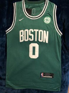 the boston basketball jersey is displayed on display