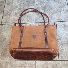 Great Vintage Condition. Inside Is Super Clean. No Stains On Outside . Little Zip Pockets Needs Quick Cleaning As It Has Faint Gray Smudge Shown In Pics. Some Marking On Bottom But Just Needs Oiled. Darker Color Is Leather And Lighter Is Brushed Leather/Suede. One Small Compartment And One Large Compartment On Interior. All Zip Closures. Brown Bags With Suede Lining For Everyday Use, Brown Shoulder Bag With Suede Lining For Everyday Use, Classic Bags With Suede Lining For Everyday Use, Classic Travel Shoulder Bag With Suede Lining, Classic Everyday Bags With Suede Lining, Beige Bag With Suede Lining For Everyday Use, Elegant Brown Bags With Waxed Finish, Brown Waxed Finish Bags For Adventure, Vintage Brown Canvas Bag With Waxed Finish