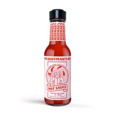 a bottle of hot sauce on a white background